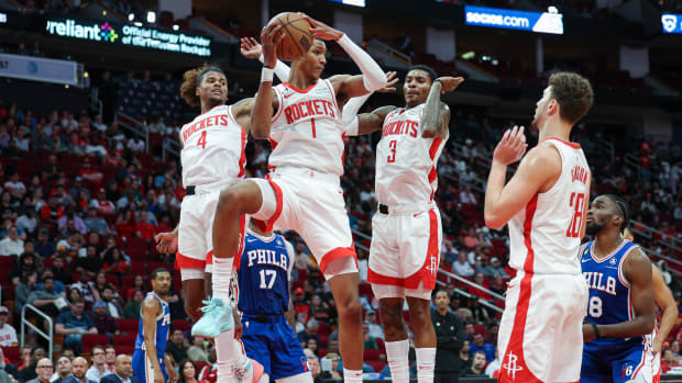 Dec 5, 2022; Houston, Texas, USA; Houston Rockets forward Jabari Smith Jr. (1) grabs a rebound during the third quarter against the Philadelphia 76ers at Toyota Center. Mandatory Credit: Troy Taormina-USA TODAY Sports